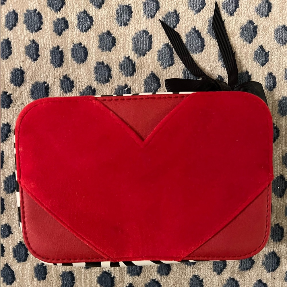 Trish McEvoy red / zebra print makeup organizer bag. Used once. Great condition!